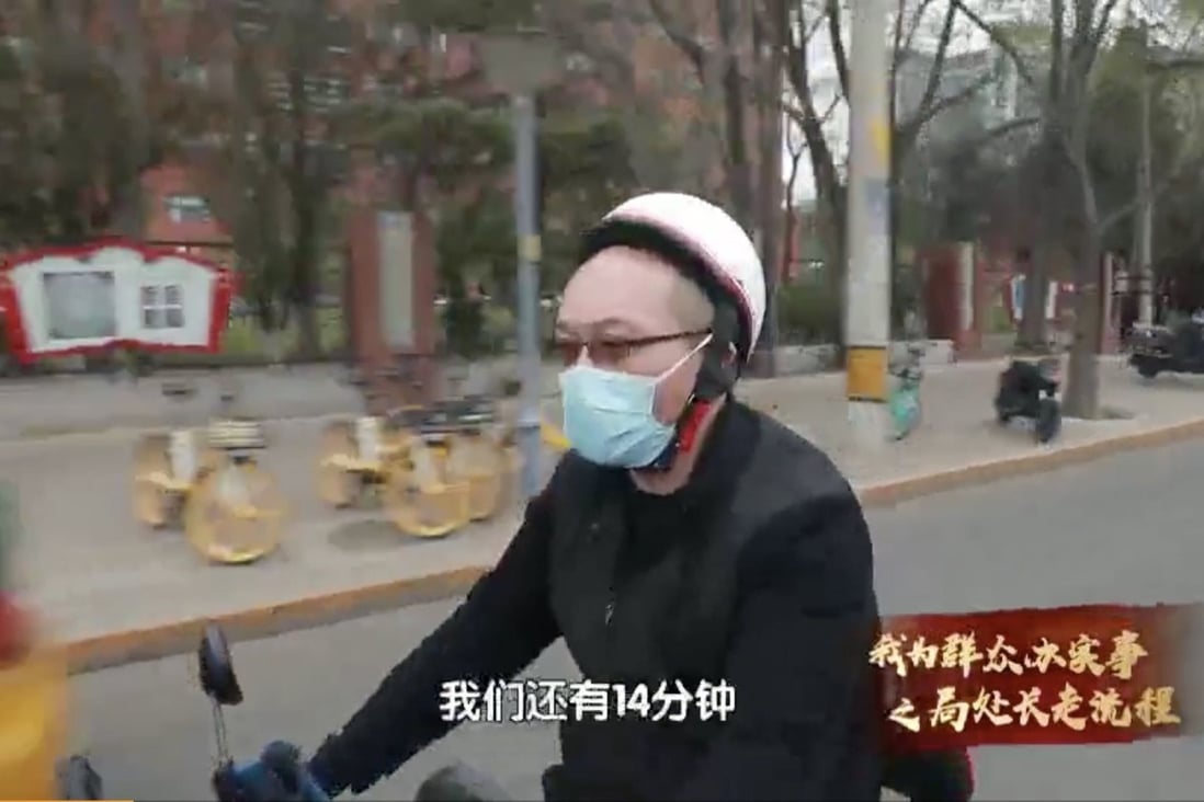 Wang Lin, the deputy director of the Beijing Municipal Human Resources and Social Security Bureau's labour relations division, is shown spending a day working as a Meituan delivery driver in Beijing, China, in a video clip released on April 28, 2021. Photo: Screenshot via Weibo