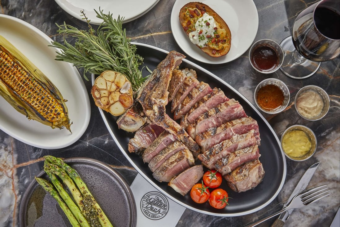 The Upper Deck’s 21- to 30-day dry-aged USDA porterhouse with side dishes. Photo: handout