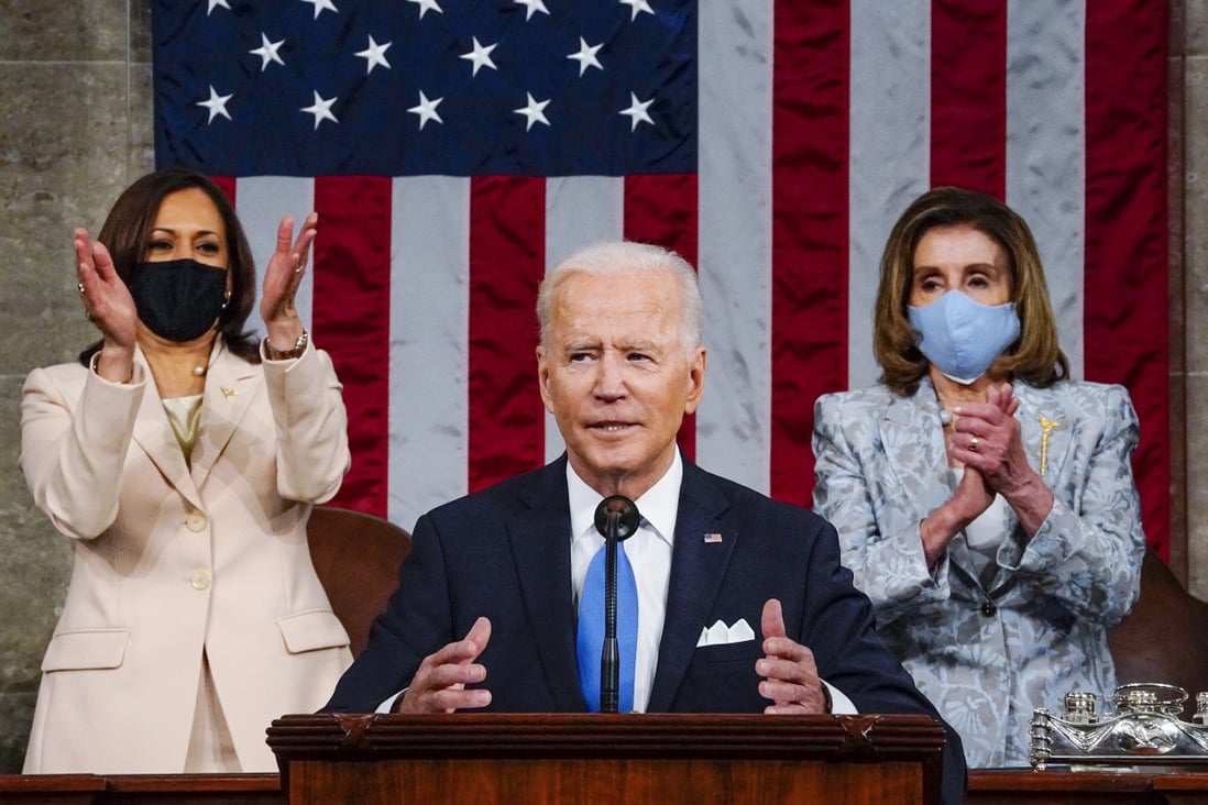 US President Joe Biden addresses a joint session of Congress, flanked by Vice-President Kamala Harris and House Speaker Nancy Pelosi. Photo: AP