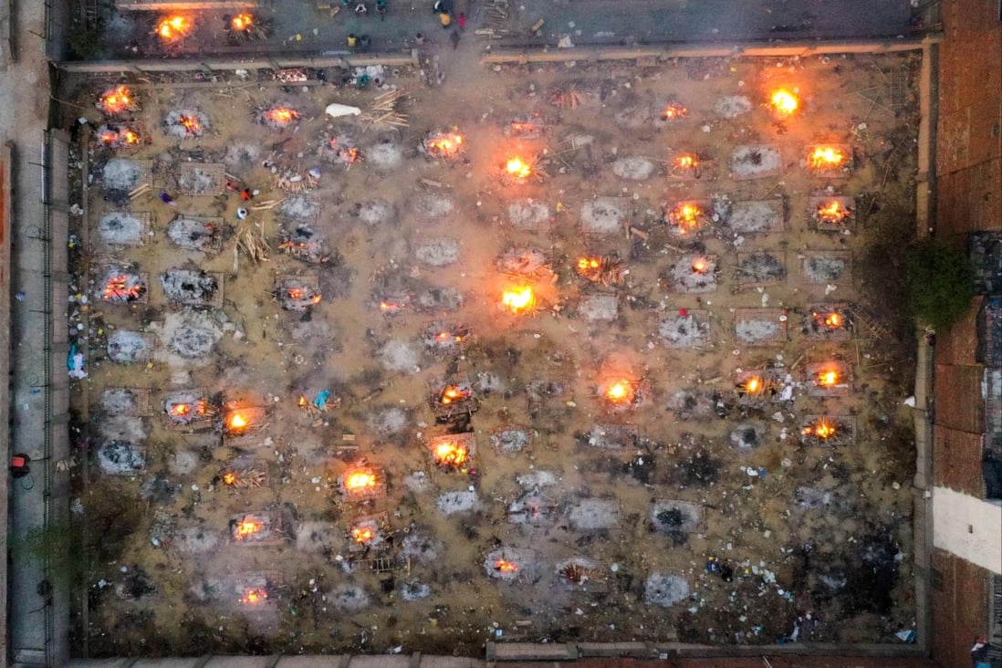 Burning pyres of victims who lost their lives to Covid-19 cover a cremation ground in New Delhi. Photo: AFP