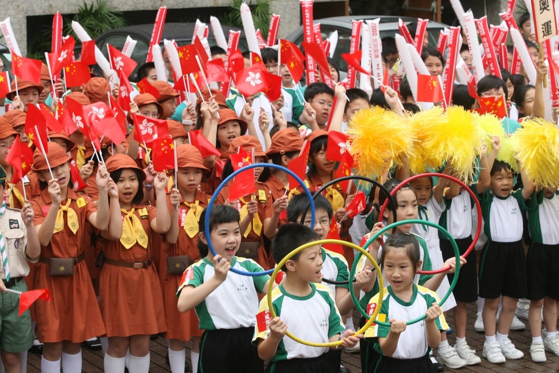Children in Hong Kong show their support for the Beijing 2008 Olympic Torch relay. Photo: SCMP Pictures