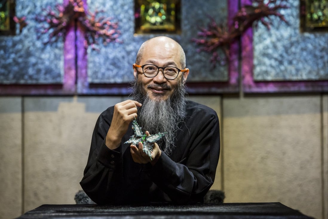 Wallace Chan with one of his jewellery pieces. Four decades ago he had an encounter with a book about the work of Michelangelo that changed his life. Photo: Isaac Lawrence