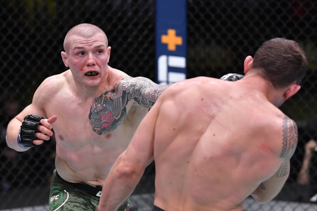 Marvin Vettori punches Jack Hermansson in their middleweight bout. Photos: Chris Unger/Zuffa LLC