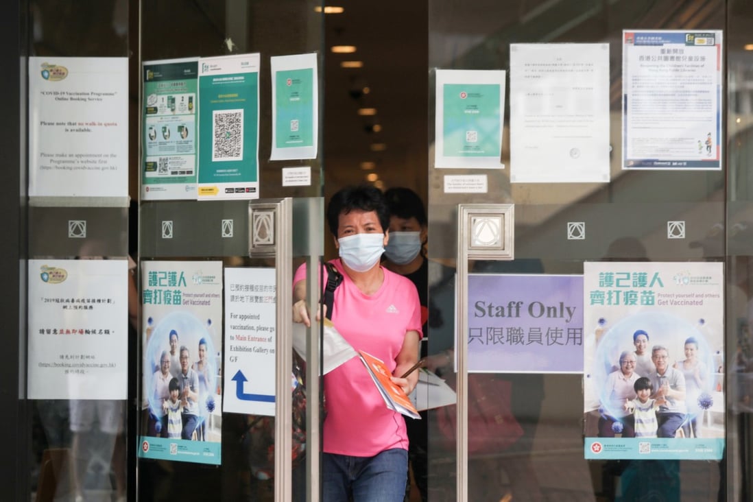 A woman comes out of the vaccine centre at Central Library in Causeway Bay. Photo: Xiaomei Chen
