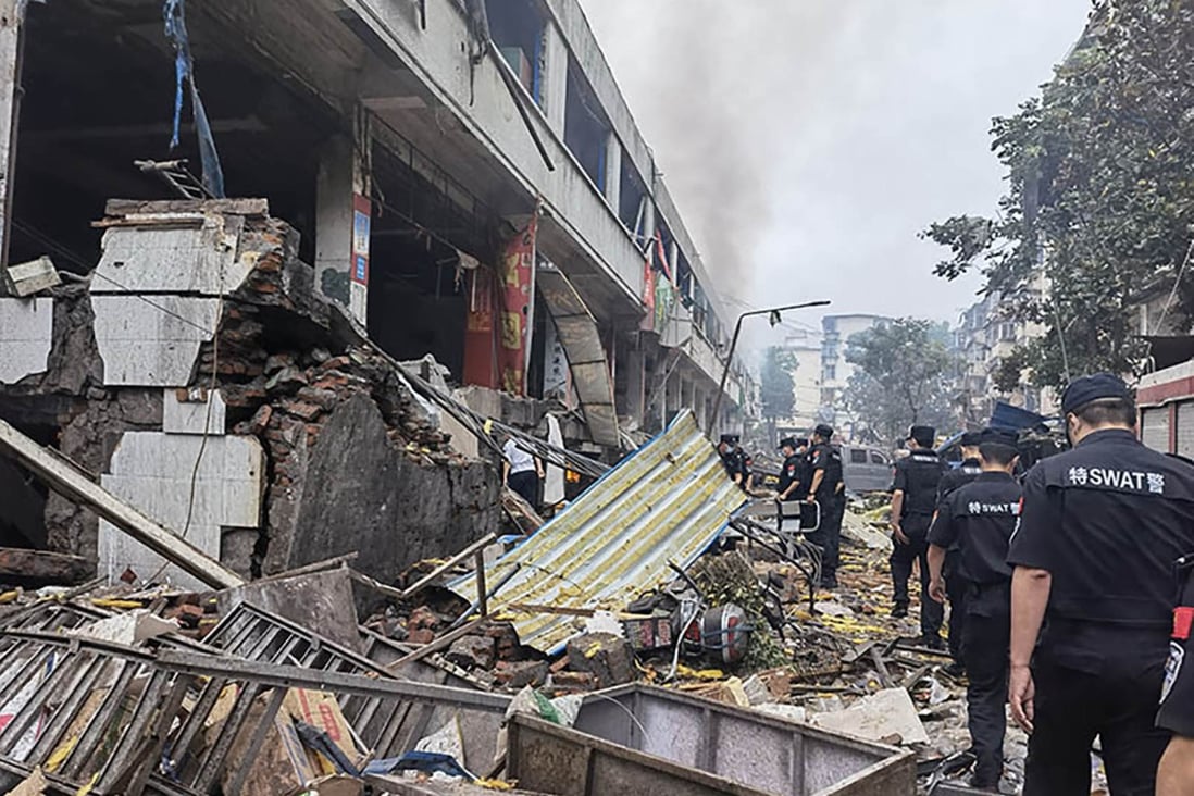 Police inspect the site of the explosion in Shiyan city. Photo: Handout