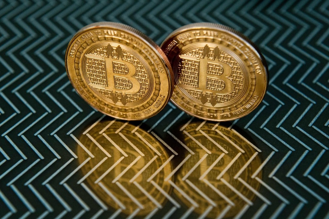 Some banking and finance experts say cryptocurrencies like bitcoin can offer a hedge against inflation. Photo: AFP