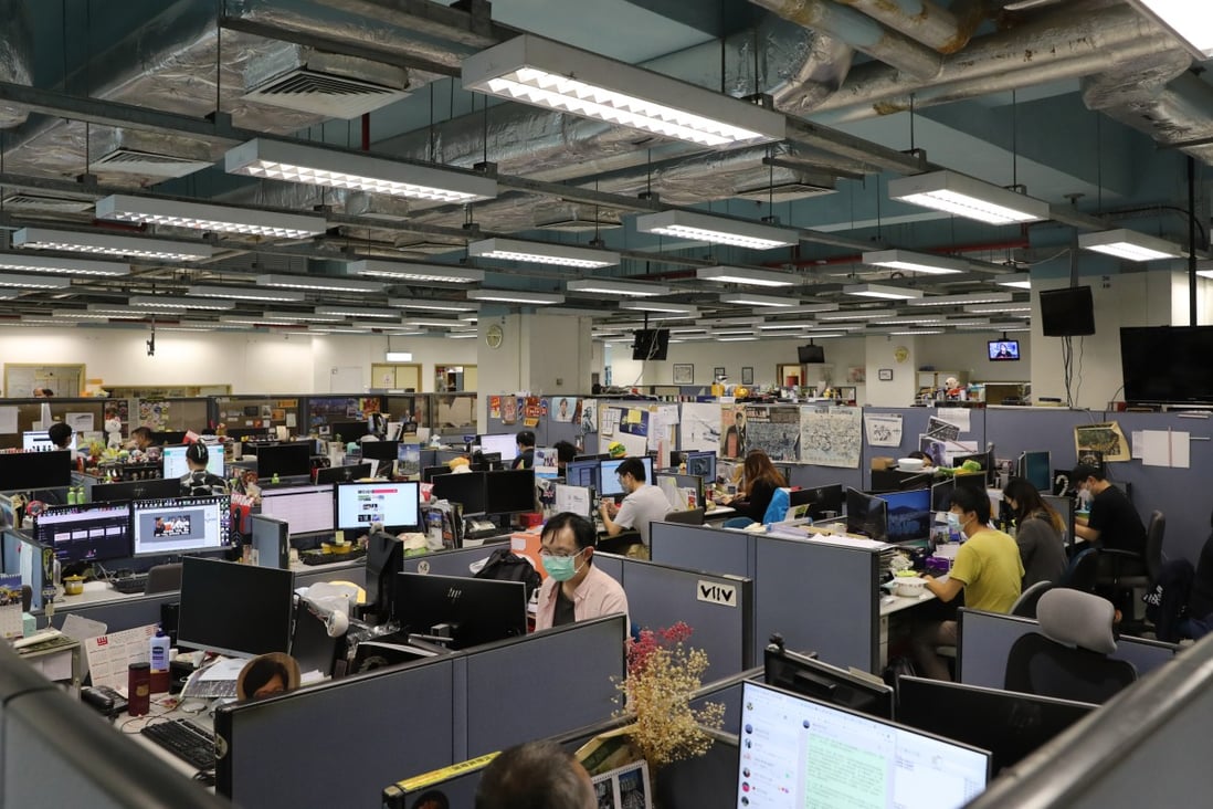 Staff of Apple Daily in their Tseung Kwan O office. Photo: Sam Tsang