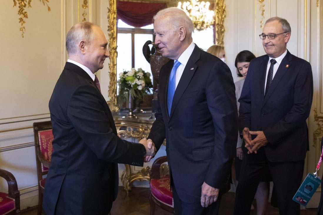 Russian President Vladimir Putin and  US President Joe Biden shake hands in Geneva on Wednesday. Photo: EPA-EFE