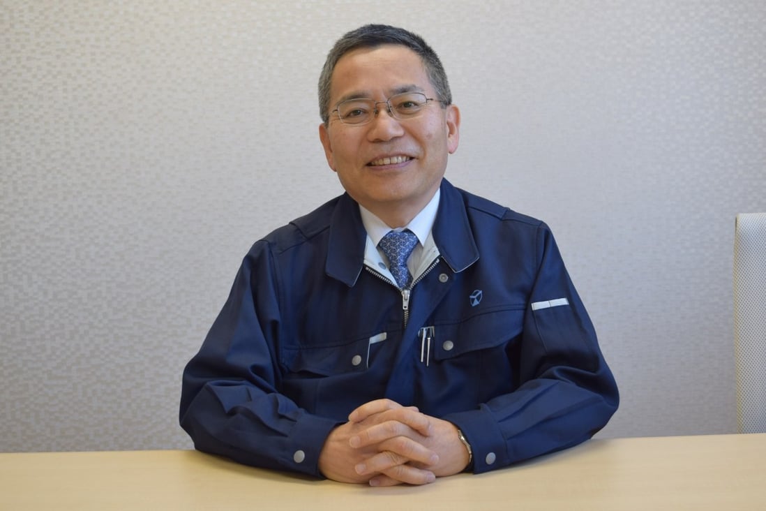 Yasuo Tanaka, president.
