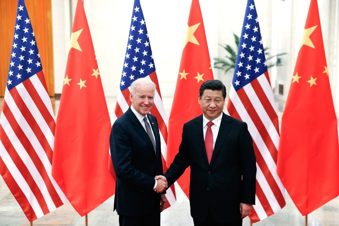 US President Joe Biden with Chinese President Xi Jinping in Beijing in 2013. Photo: TNS