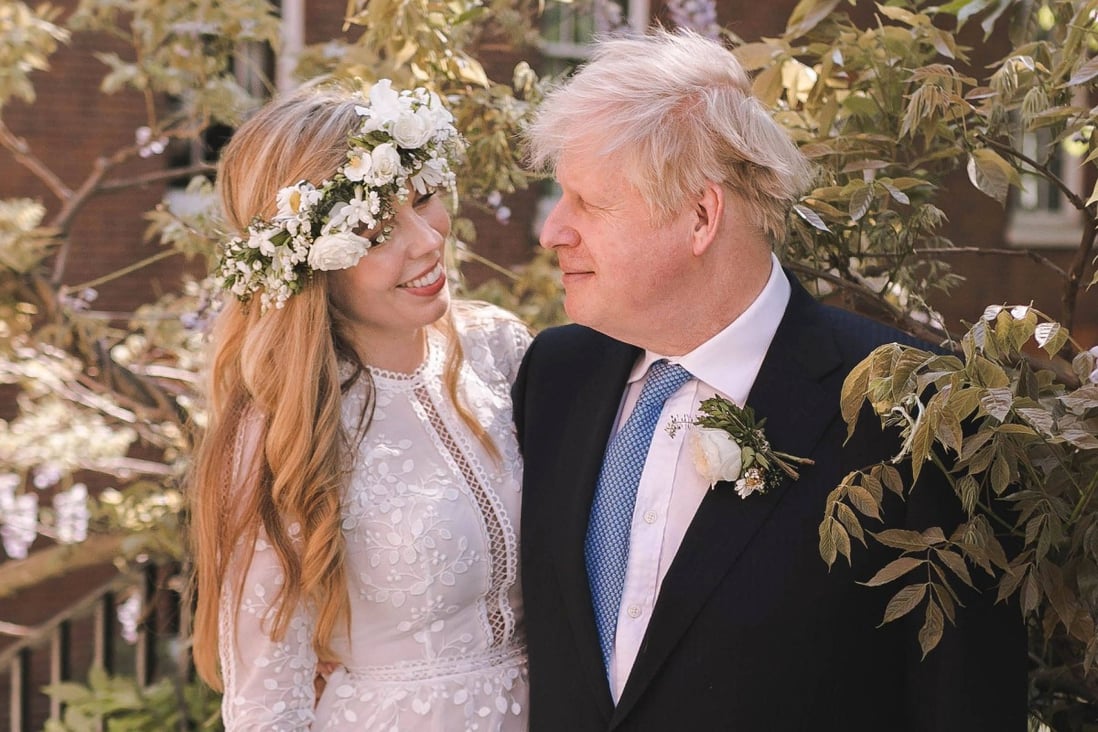 British Prime Minister Boris Johnson and his wife Carrie Johnson in the garden of 10 Downing Street, London after their wedding on May 29. Symonds rented a wedding gown from My Wardrobe HQ for the occasion. Photo: AFP