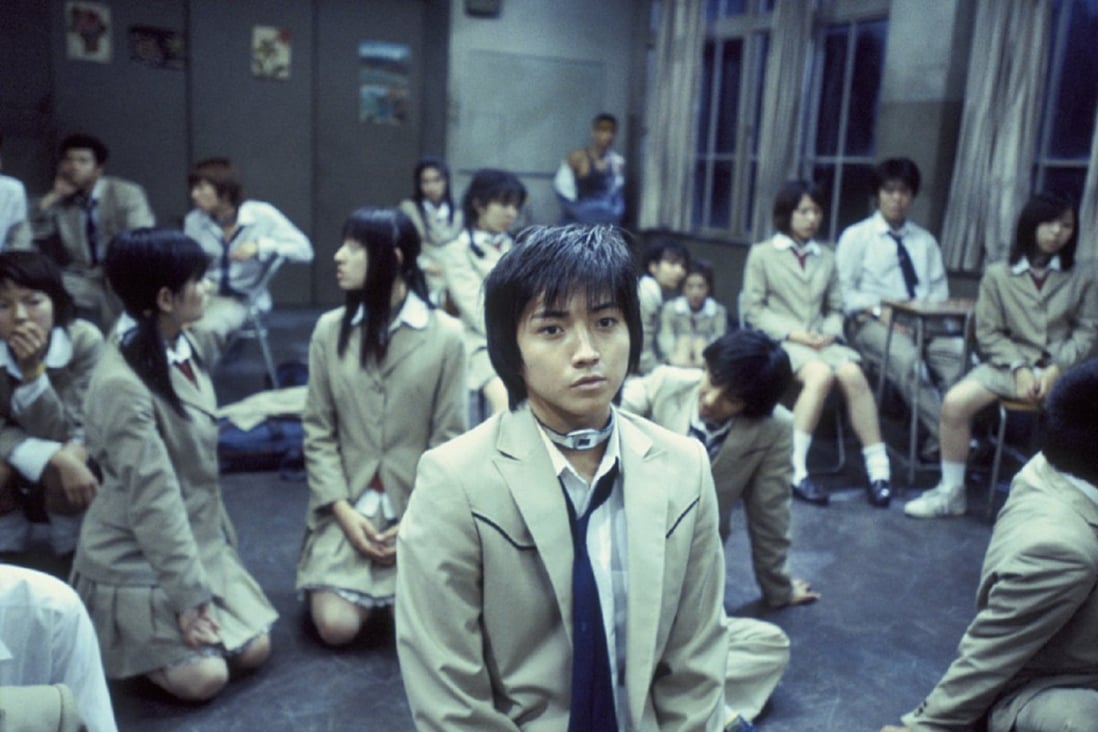 Tatsuya Fujiwara in a still from the Japanese action thriller Battle Royale (2000), directed by Kinji Fukasaku.