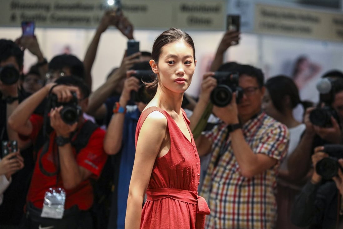 A model poses on the runway during Hong Kong Fashion Week on July 8, 2019. While it might be a tall order for Hong Kong to build a clothing brand that can rival the market giants, the city remains a major trendsetter in the region. Photo: Nora Tam 