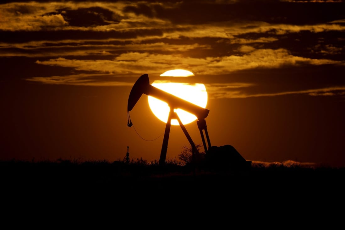 The sun sets behind an idle pump jack near Karnes City, Texas, on April 8, 2020. In the US, the Biden administration has adopted an “all-of-government” approach to hobble domestic oil and gas production and fight climate change. Photo: AP 