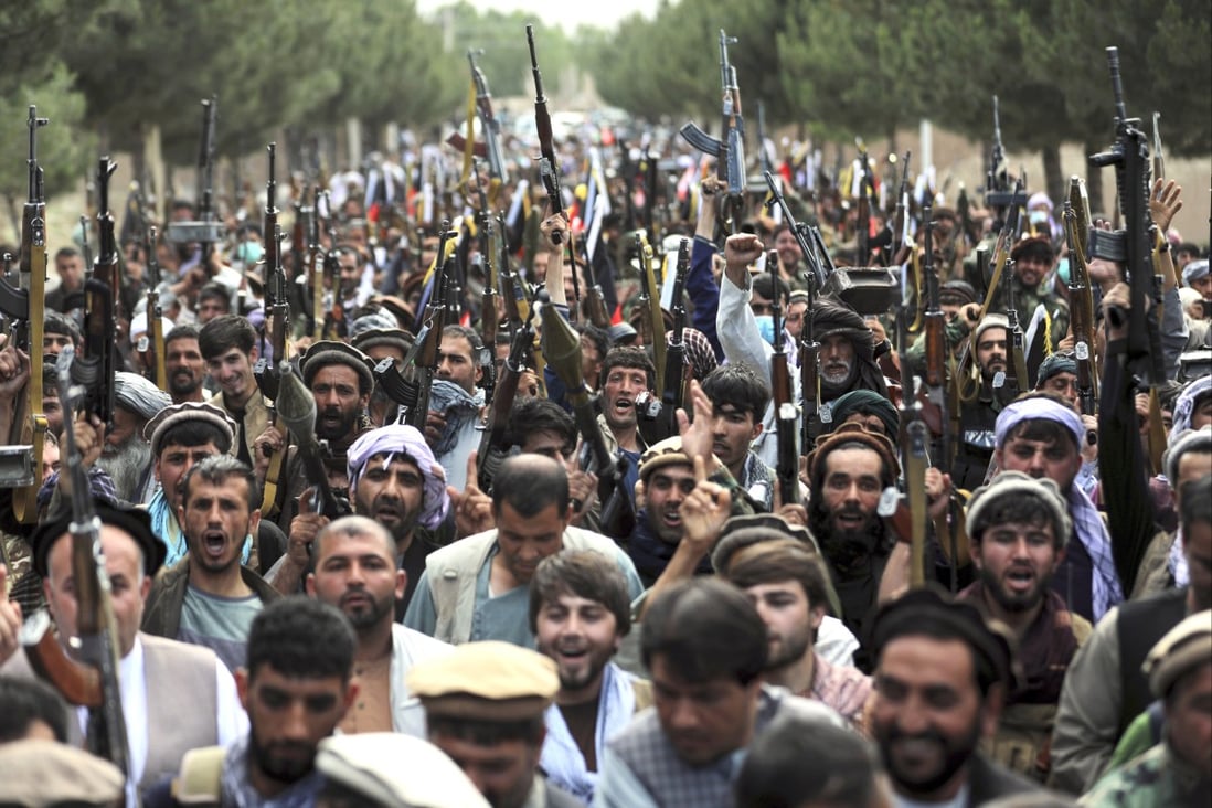 Militiamen join Afghan security forces during a gathering in Kabul, Afghanistan, as the US prepares to withdraw. Photo: AP