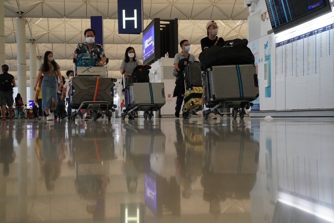 Travellers at Hong Kong airport on June 30, a day before a ban on all passenger flights from Britain came into force. Photo: Felix Wong