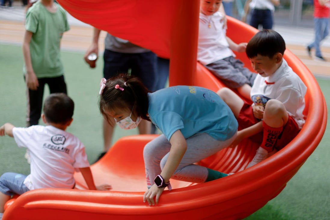Children play at a playground inside a shopping complex in Shanghai on June 1. Photo: Reuters