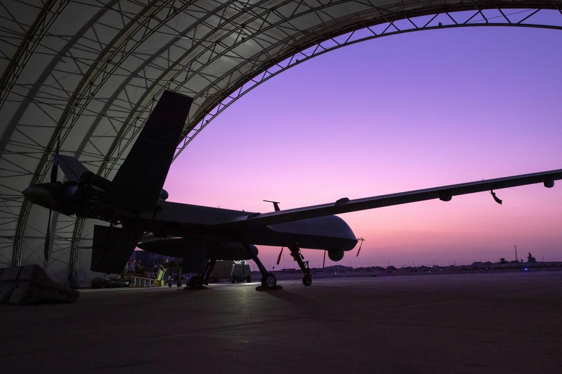 A US Air Force MQ-9 Reaper remotely piloted aircraft awaits an engine test prior to an intelligence, surveillance, and reconnaissance operation at Ali Al Salem Air Base, Kuwait, in 2019. Photo: US Air Force / AFP