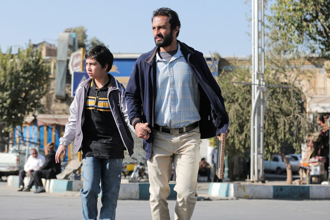 Amir Jadidi (right) in a scene from A Hero, directed by Iranian auteur Asghar Farhadi.