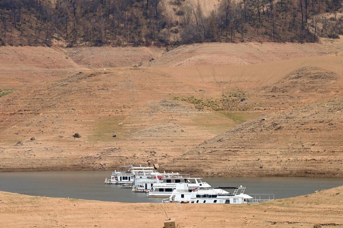 Houseboats sit in low water on Lake Oroville on July 25 as California’s drought emergency worsens. Photo: AFP