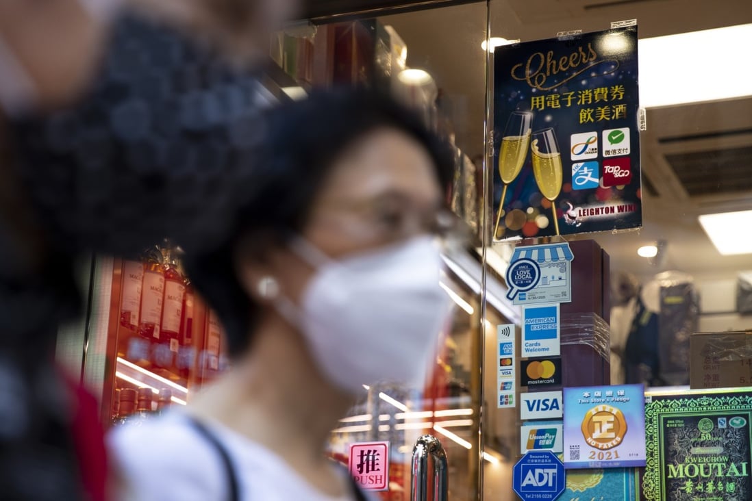 Shops in Causeway Bay get ready with payment systems as the Hong Kong government prepares to give out HK$5,000 in consumption vouchers to each eligible resident from August 1. Photo: Warton Li