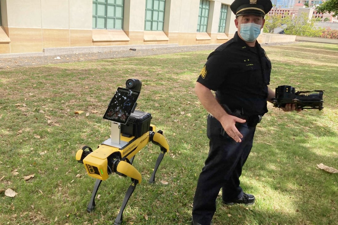 The Honolulu police demonstrate a robotic dog. Police departments say the canine bots are used like drones or other robots to keep humans safe. Photo: AP/Jennifer Sinco Kelleher