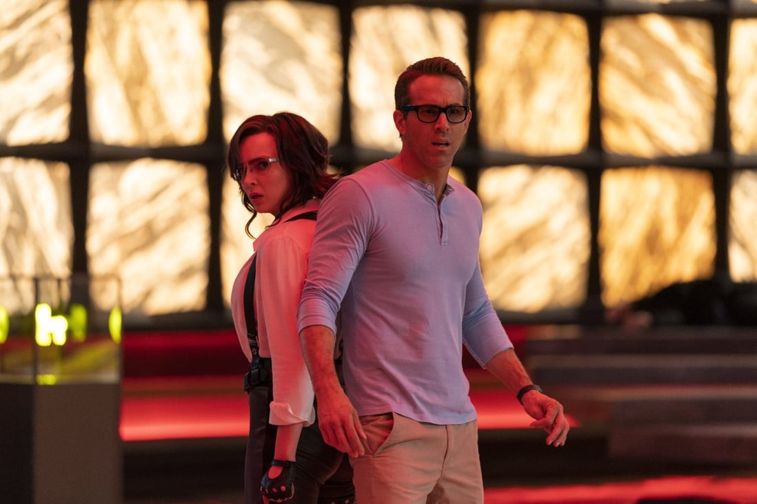 Jodie Comer as Molotov Girl and Ryan Reynolds as Guy in a still from Free Guy (category: IIA), directed by Shawn Levy. Taika Waititi co-stars. Photo: Alan Markfield/Twentieth Century Fox Film Corporation