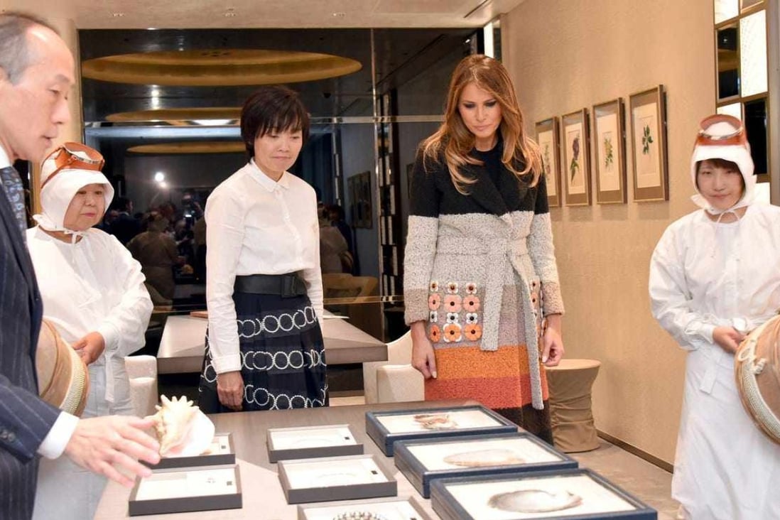 Melania Trump and Japan’s first lady, Akie Abe, who gave Melania a pair of pearl earrings – just one of many gifts she received. Photo: AP