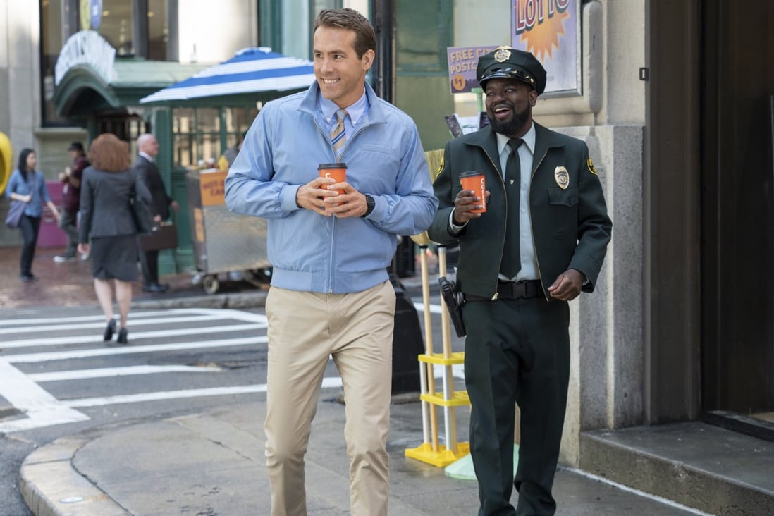 Ryan Reynolds (left) and Lil Rel Howery in a scene from Free Guy where most of the action takes place in a video game. Photo: AP