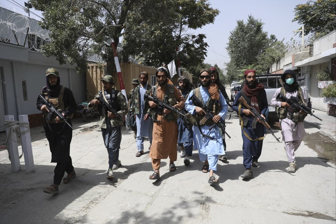 Taliban fighters patrol in the Wazir Akbar Khan neighbourhood in Kabul on August 18. Photo: AP