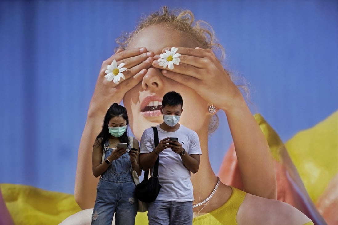 A poster in Hong Kong, which has performed a U-turn on a recent easing of quarantine measures. Photo: AP