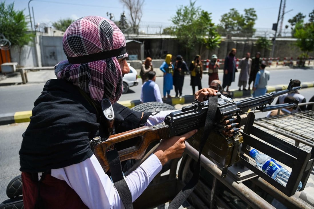 A Taliban fighter mans a machinegun while patrolling a street in Kabul. Photo: AFP