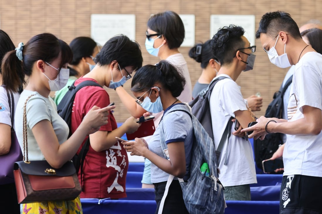 A queue at the Community Vaccination Centre at the Sun Yat Sen Memorial Park Sports Centre in Sai Ying Pun on August 21. If no booster shots are offered soon, the vaccination programme will become a leaky bucket, with those vaccinated early on losing protection, especially against the Delta variant. Photo: Dickson Lee