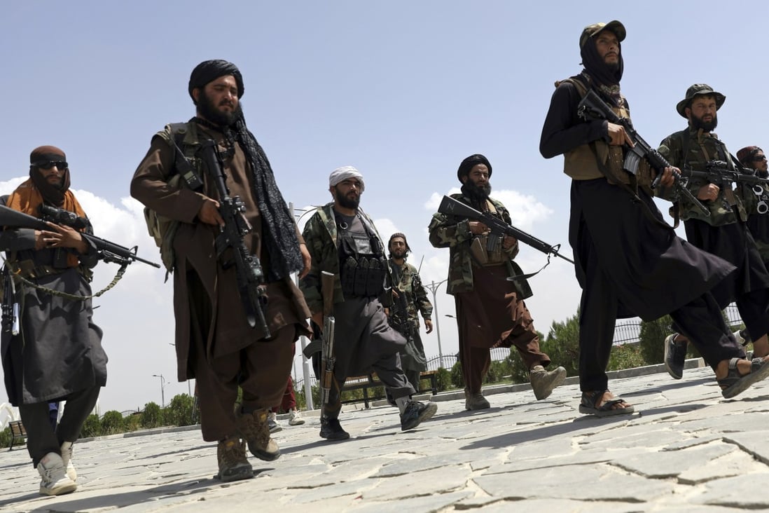 Taliban fighters patrol Kabul on August 19. After the Taliban takeover, employees of the collapsed government, civil society activists and women are among the at-risk Afghans who have gone into hiding or are staying off the streets. Photo: AP