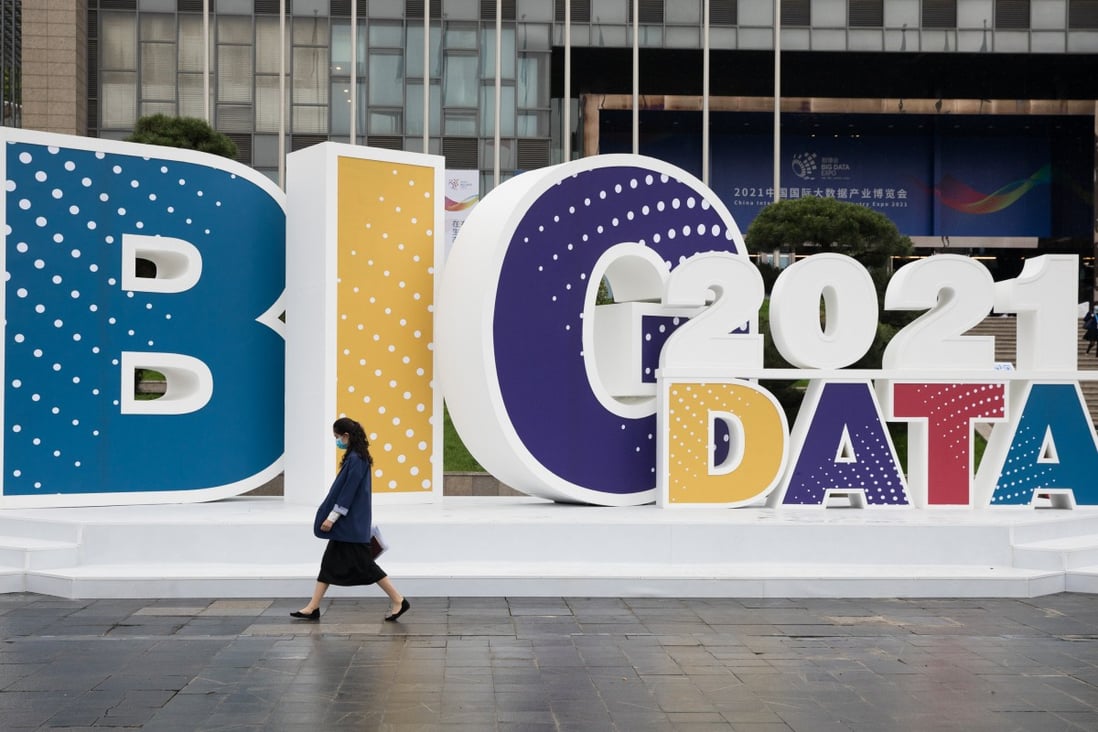 A visitor walks past an outdoor installation at the China International Big Data Industry Expo 2021 in Guiyang, Guizhou province, on May 26. Photo: Xinhua