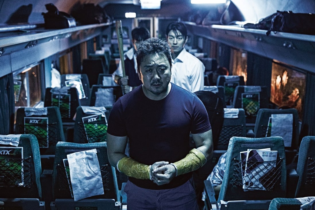 Ma Dong-seok (front) and Gong Yoo in a still from Train to Busan (2016). The Korean zombie apocalypse hit will be remade by Hollywood, and fans of the original aren’t happy.