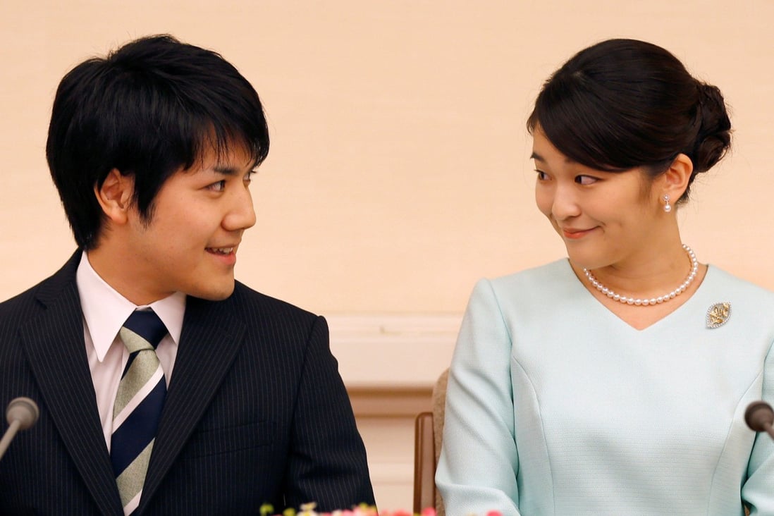 Princess Mako, the elder daughter of Prince Akishino and Princess Kiko, and her fiancé Kei Komuro, a university friend of Princess Mako, smile during a press conference to announce their engagement at Akasaka East Residence in Tokyo, Japan, in September 2017. Photo: Reuters