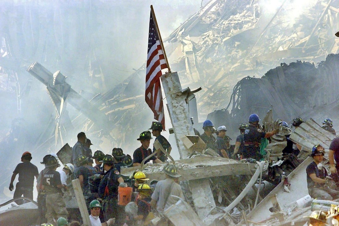 A US flag is posted in the rubble of the World Trade Centre in New York  on September 13, 2001. On September 11, 2001, during a series of coordinated terror attacks using hijacked airplanes, two airplanes were flown into the World Trade Centre’s twin towers causing the collapse of both towers. Photo: EPA-EFE