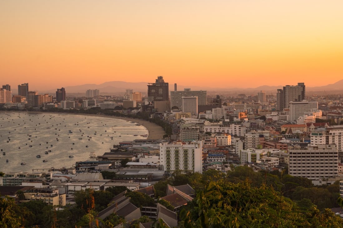 Pattaya Beach with the city behind it at sunrise. Photo: Getty Images