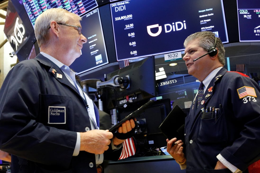 Traders work on the New York Stock Exchange floor during the IPO for Chinese ride-hailing company Didi Global Inc on June 30. Didi is just one of the many Chinese tech companies caught up in Beijing’s crackdown on Big Tech. Photo: Reuters