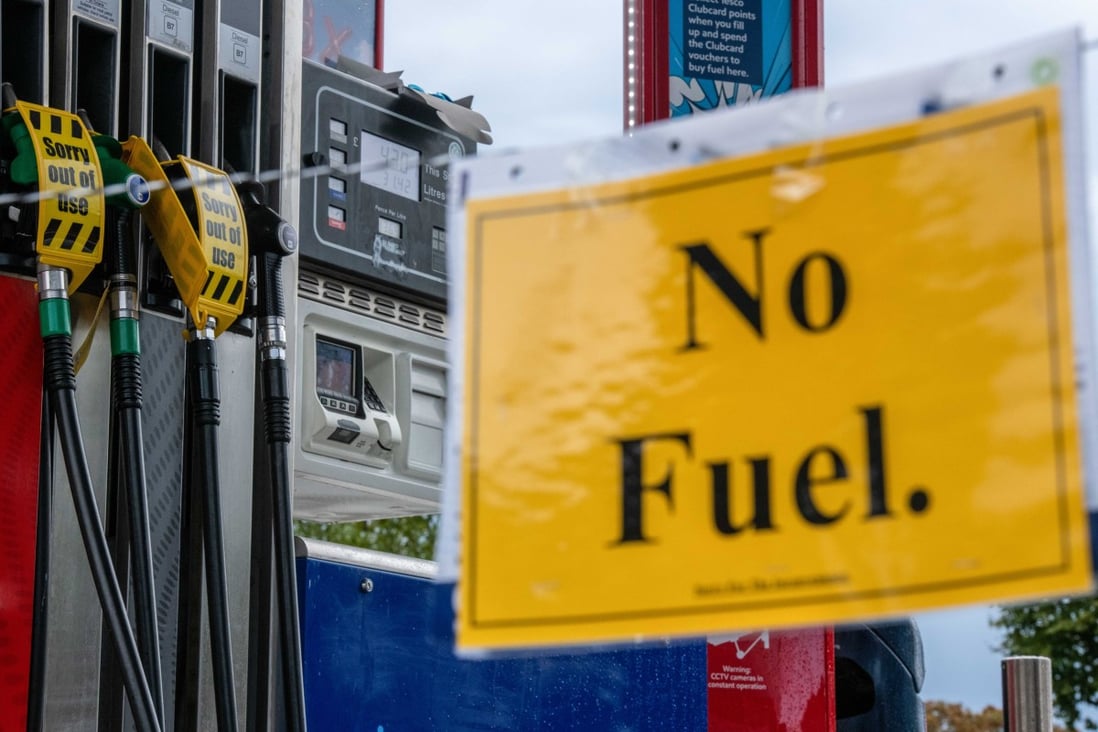 A sign on the forecourt of a petrol station in London on October 1 as Britons resort to panic buying. By 2050, 86 per cent of all cars need to be electric, according to the IEA, compared with 1 per cent today. Photo: Bloomberg