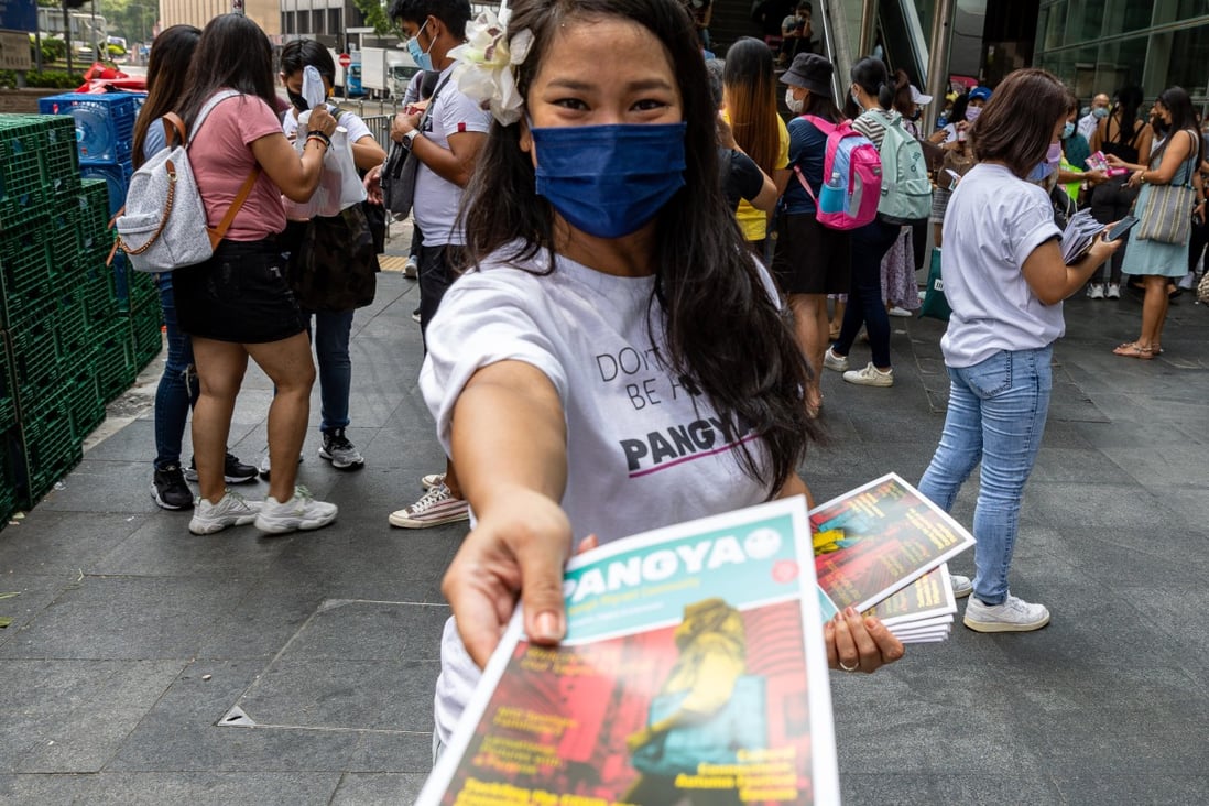 Pangyao gives a voice to the often under-represented sectors of Hong Kong society, says co-founder Aileen Alonzo-Hayward, pictured handing out copies in Central. Photo: courtesy of Pangyao Magazine