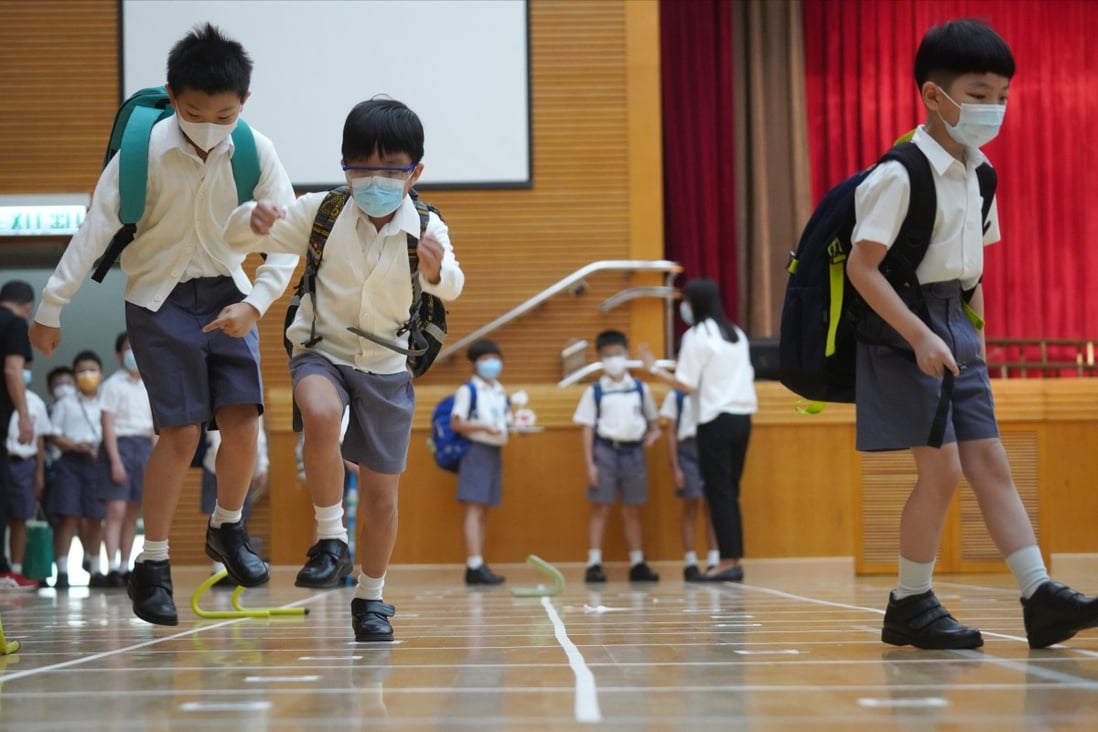 Students jump through a mini obstacle course as classes resume at Ying Wa Primary School in Cheung Sha Wan on September 29, 2020. Photo: Winson Wong