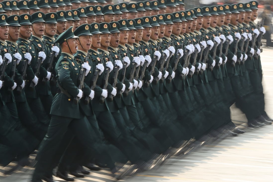 Soldiers of the People’s Liberation Army march in Beijing in 2019. Hong Kong’s disciplined services adopted the Chinese goose-step marching style earlier this year to the surprise of many. Photo: Getty Images