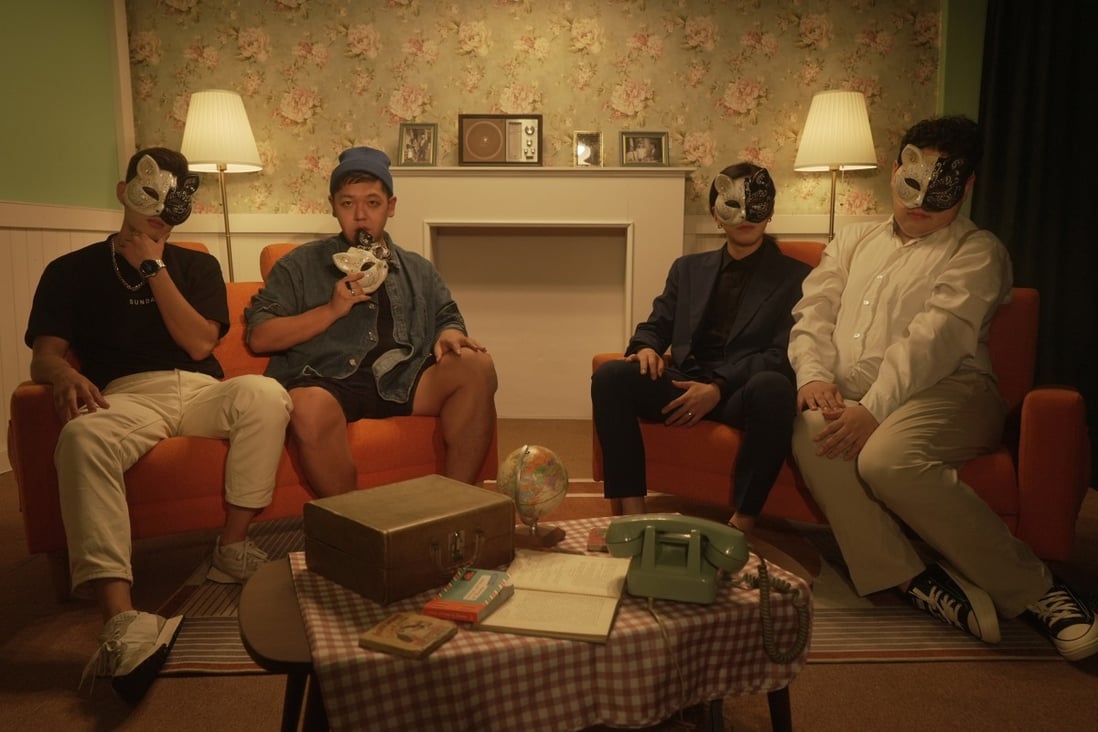 A still from Lionesses’ music video accompanying their debut single Show Me Your Pride, in which band members wear masks until the end, when one removes his. The K-pop group say they are the first LGBT boy band in Korean pop.