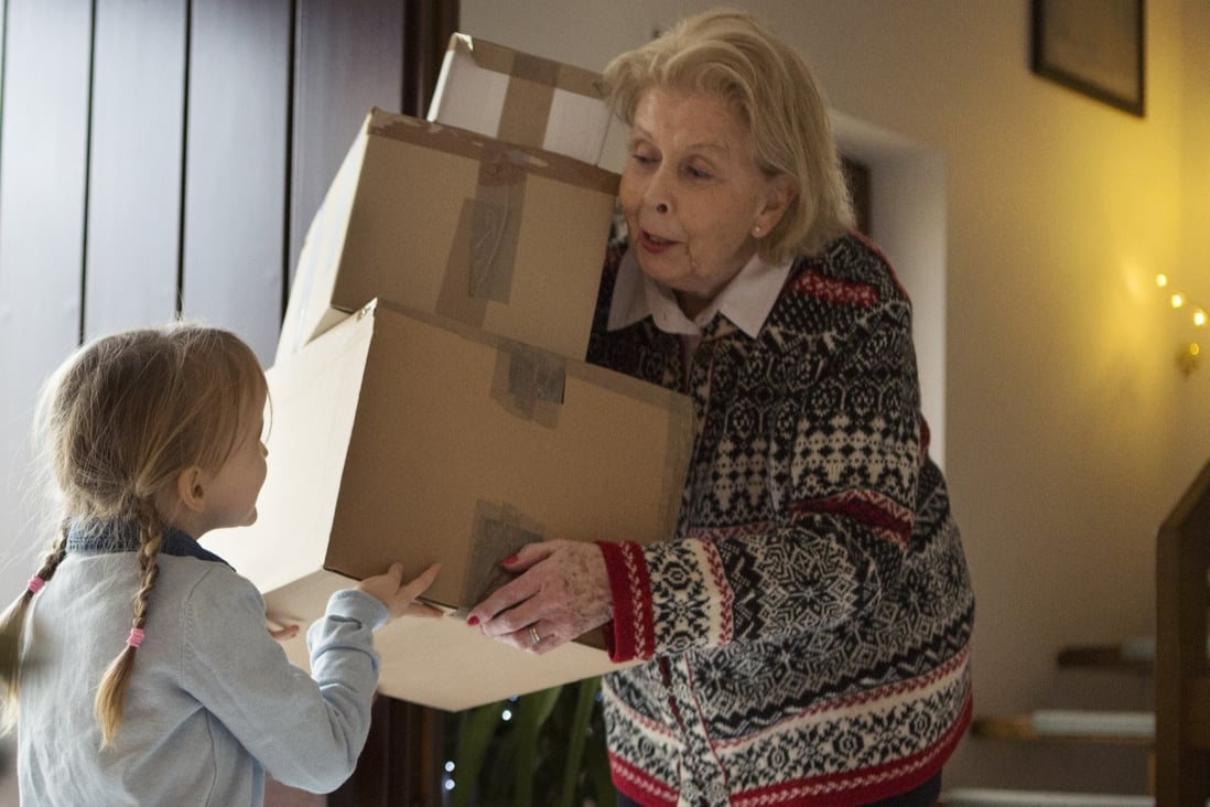 An elderly woman gets help from a grand-daughter to clear up unwanted possessions. In Sweden, death cleaning is common to remove clutter that your relatives would otherwise have to deal with later. Photo: Getty Images