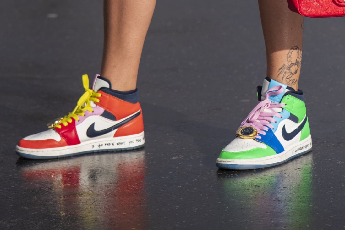 Nike sneakers featuring in street style in Paris, France. Photo: Getty Images