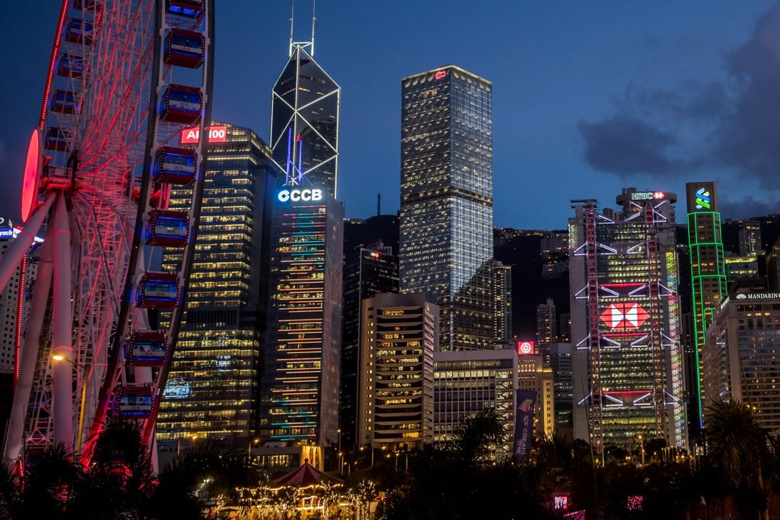 Commercial buildings at dusk in Central. In Hong Kong alone, there were HK$4.3 trillion worth of assets and HK$34.9 trillion of derivative contracts referencing Libor in September. Photo: Bloomberg 