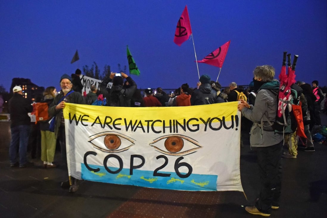 Extinction Rebellion protesters demonstrate outside the COP26 conference in Glasgow on November 8. Photo: AFP