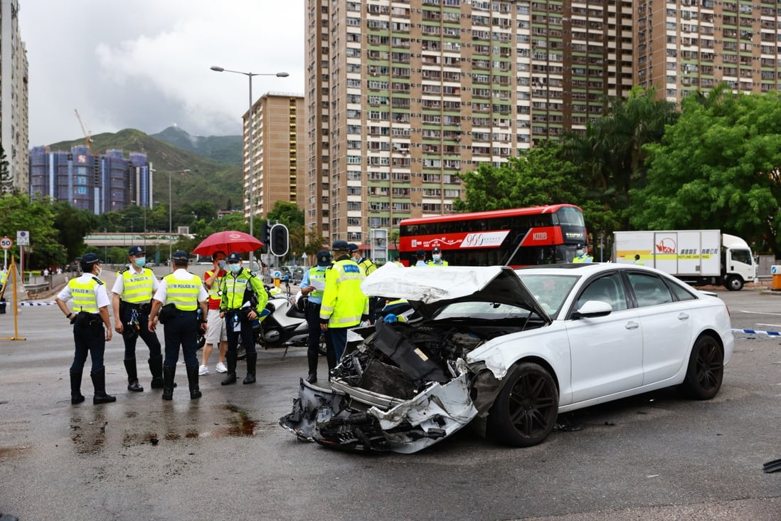 A car is severely damaged after colliding with a minibus near the junction of Sha Tin Wai Road and Tai Chung Kiu Road in Sha Tin on June 13. The 57-year-old minibus driver died and several passengers and the car driver were injured. Photo: May Tse